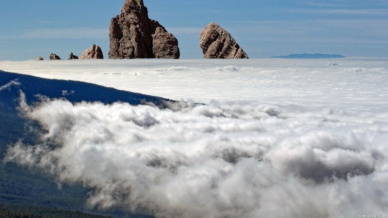 Rock Formations Above Clouds — White, Serene