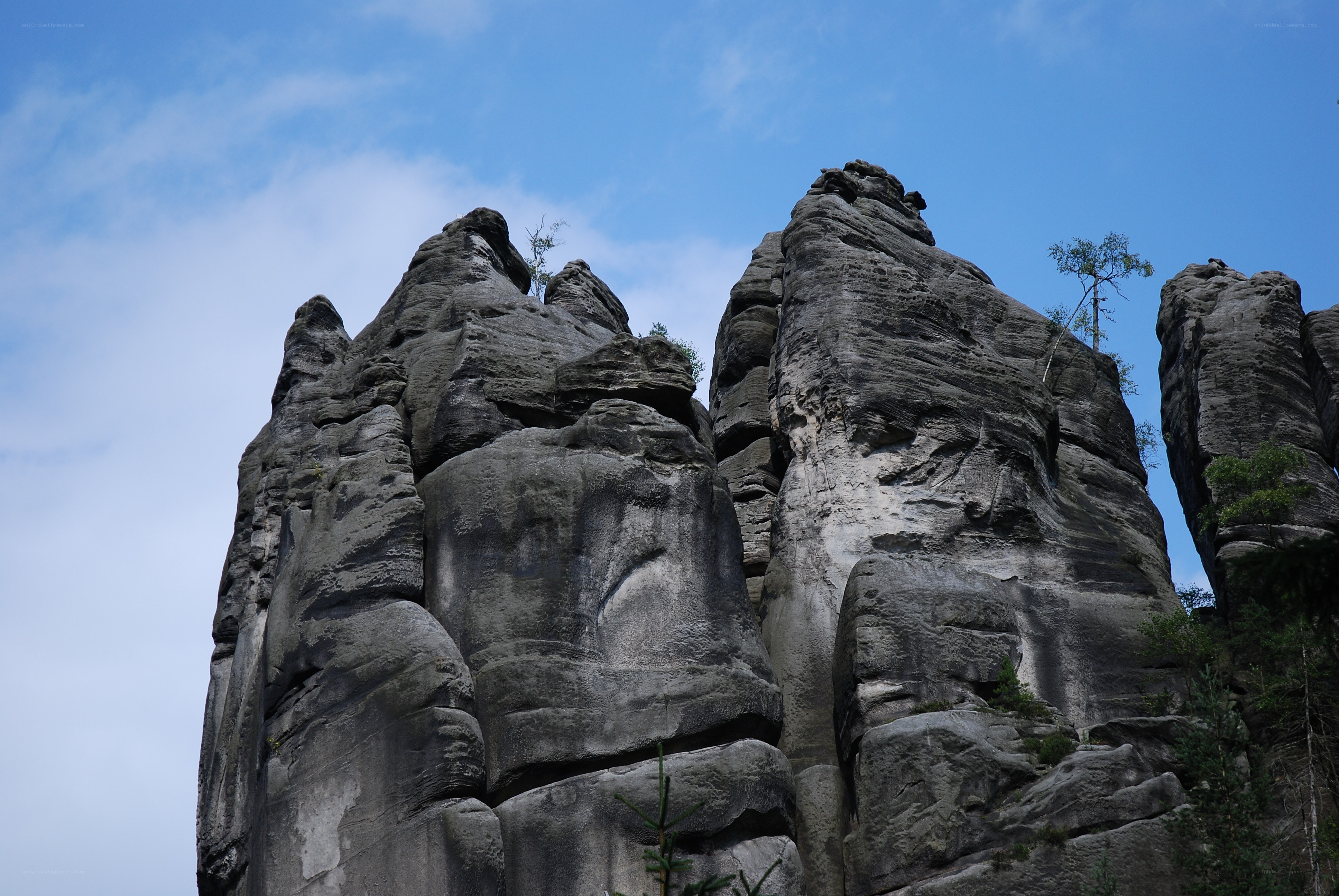 Rock formations against blue sky