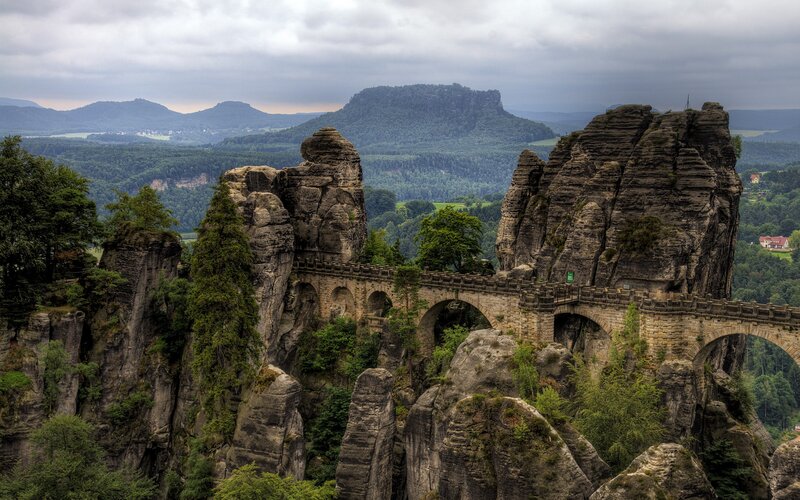 Rock Formations and Bridge — Green, Dramatic, Photograph