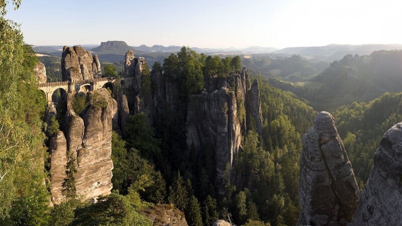 Rock Formations and Bridge — Green, Serene