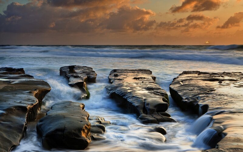 Rock Formations at Beach — Orange, Dramatic