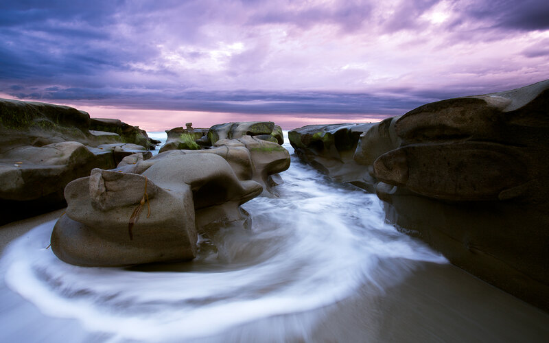 Rock Formations at Beach — Purple, Dramatic