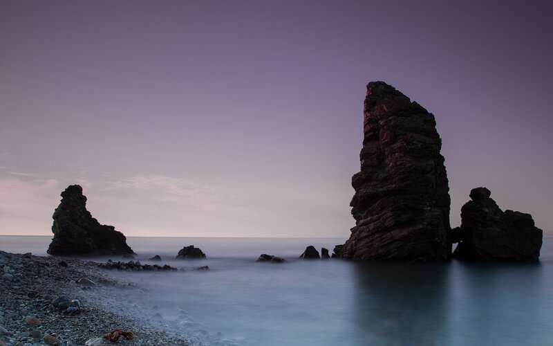 Rock Formations at Coast — Purple, Serene