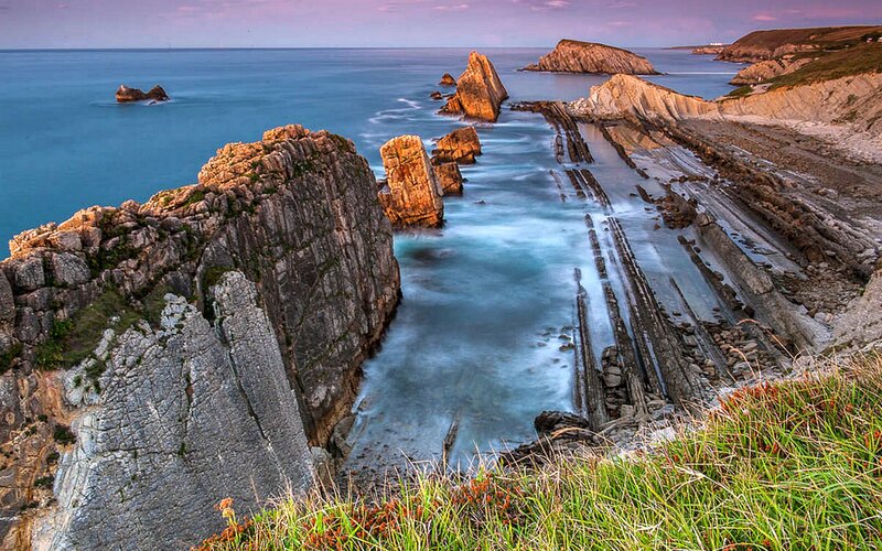 Rock Formations at Coastline — Blue, Dramatic