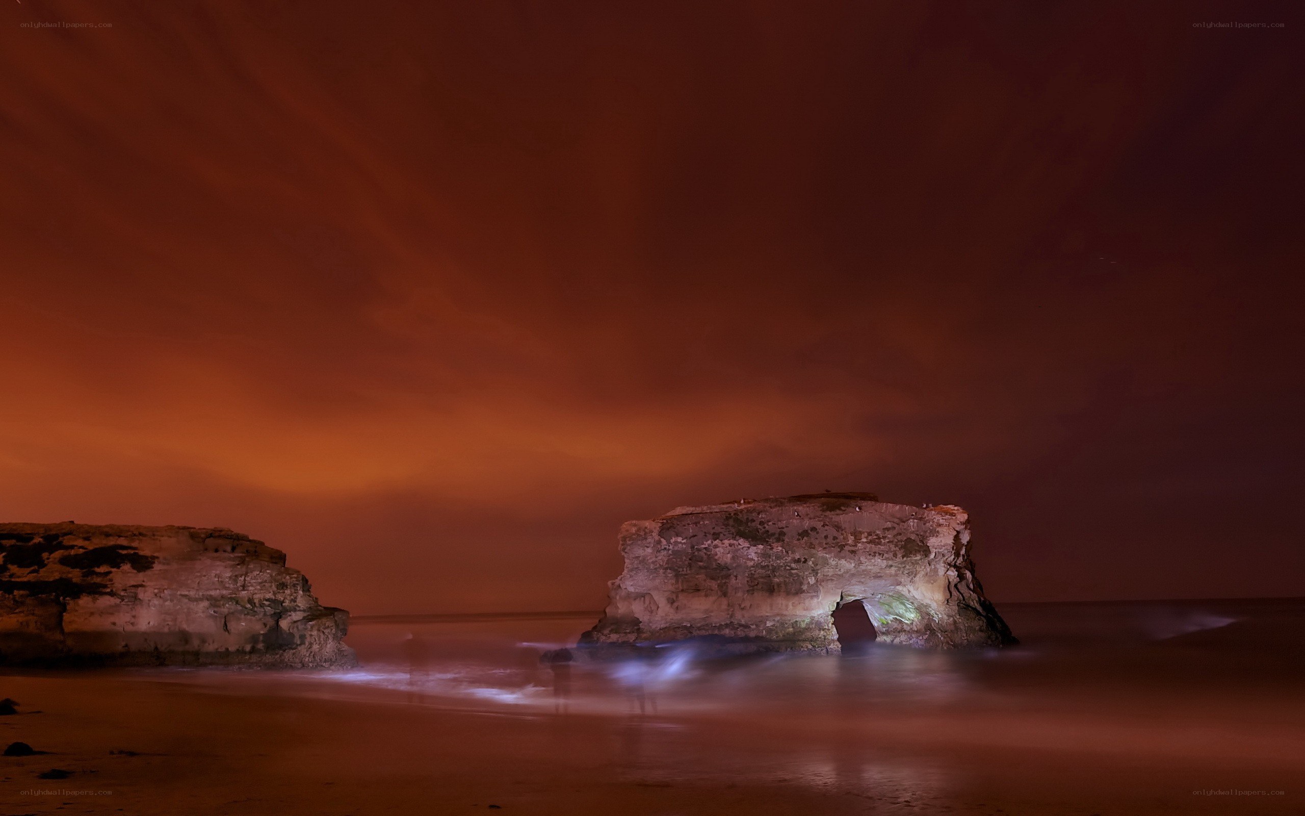 Rock formations at night on beach