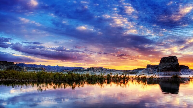 Rock Formations at Sunset — Blue, Dramatic, Photograph, Sky, Water, Plants