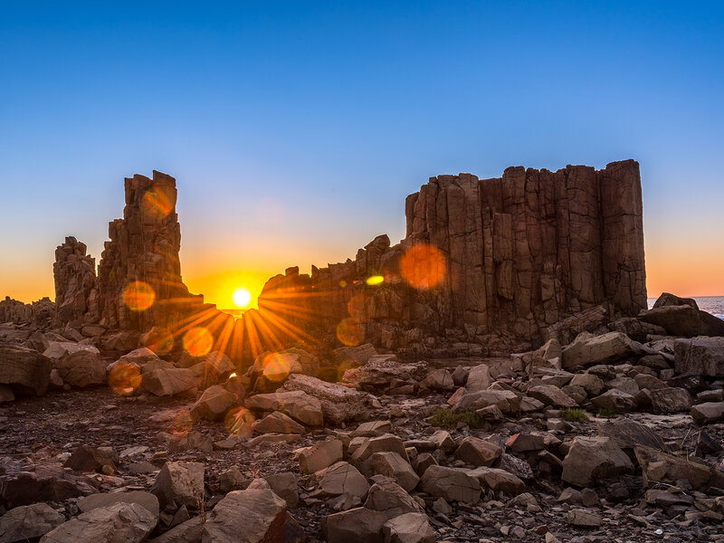 Rock Formations at Sunset — Blue, Dramatic, Photograph, Sun, Sky