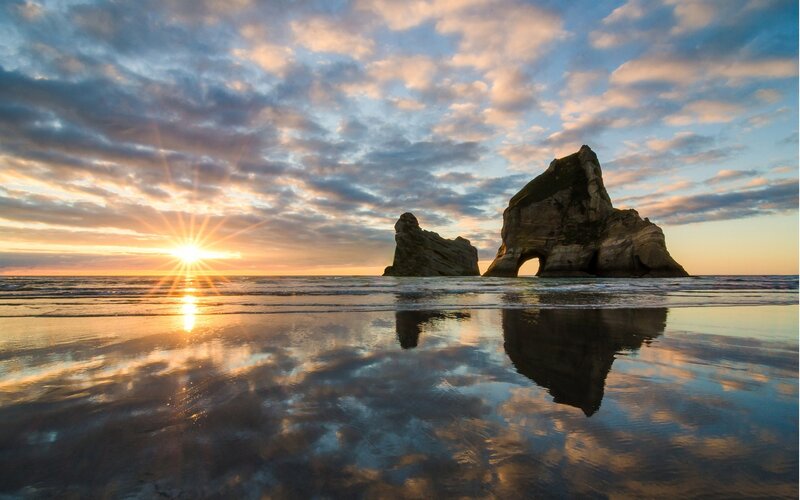 Rock Formations at Sunset — Blue, Serene, Photograph, Sun, Beach