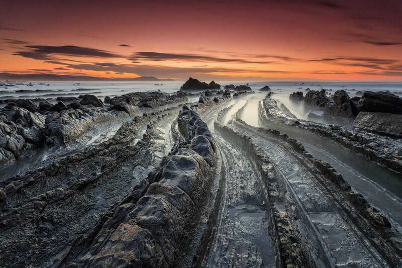 Rock Formations at Sunset — Orange, Dramatic, Photograph, Ocean, Sky, Rocks