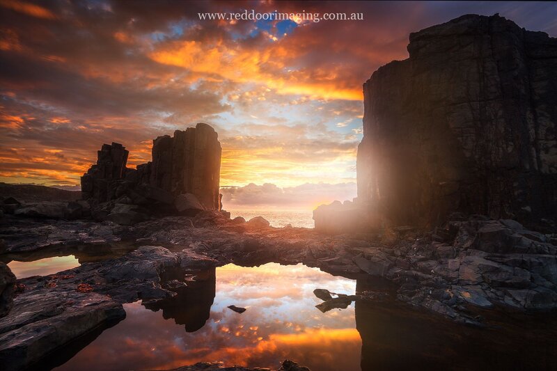 Rock Formations at Sunset — Orange, Dramatic, Photograph, Sky, Ocean