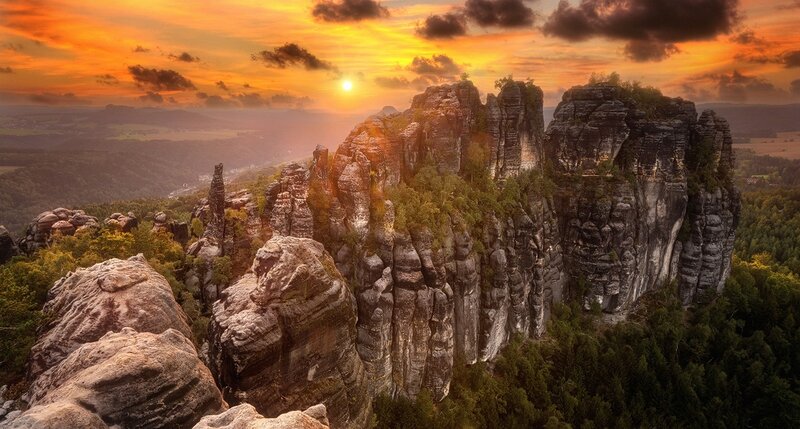 Rock Formations at Sunset — Orange, Dramatic, Photograph, Sun, Clouds, Forest