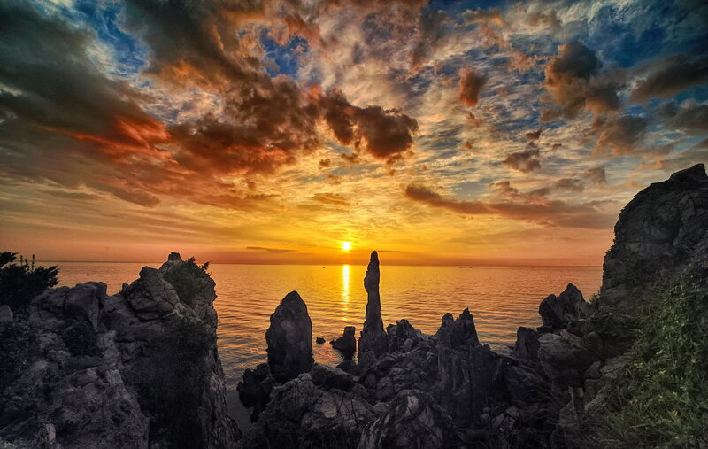 Rock Formations at Sunset — Orange, Dramatic, Photograph, Sun, Ocean