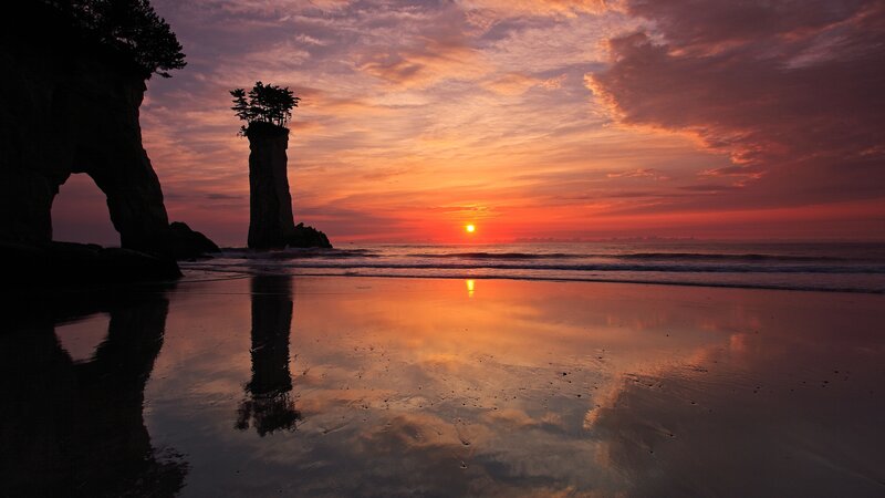 Rock Formations at Sunset — Orange, Serene, Photograph, Beach