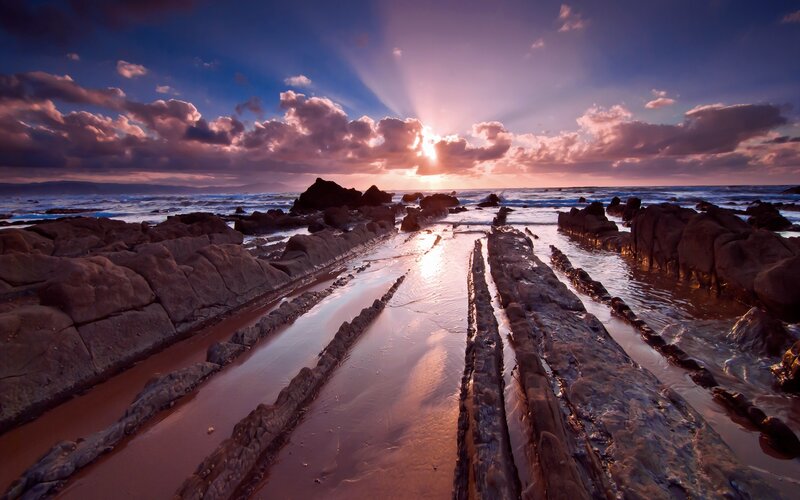 Rock Formations at Sunset — Purple, Dramatic, Photograph, Ocean, Clouds, Sun