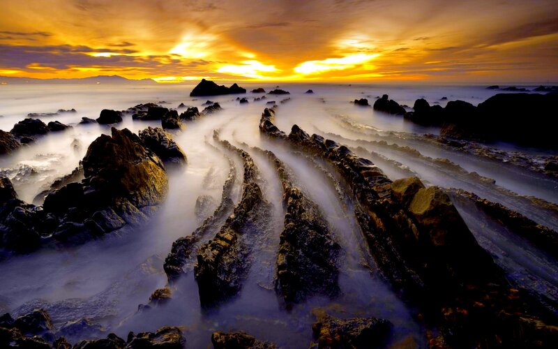 Rock Formations at Sunset — Yellow, Dramatic, Photograph