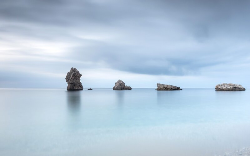 Rock formations in calm sea
