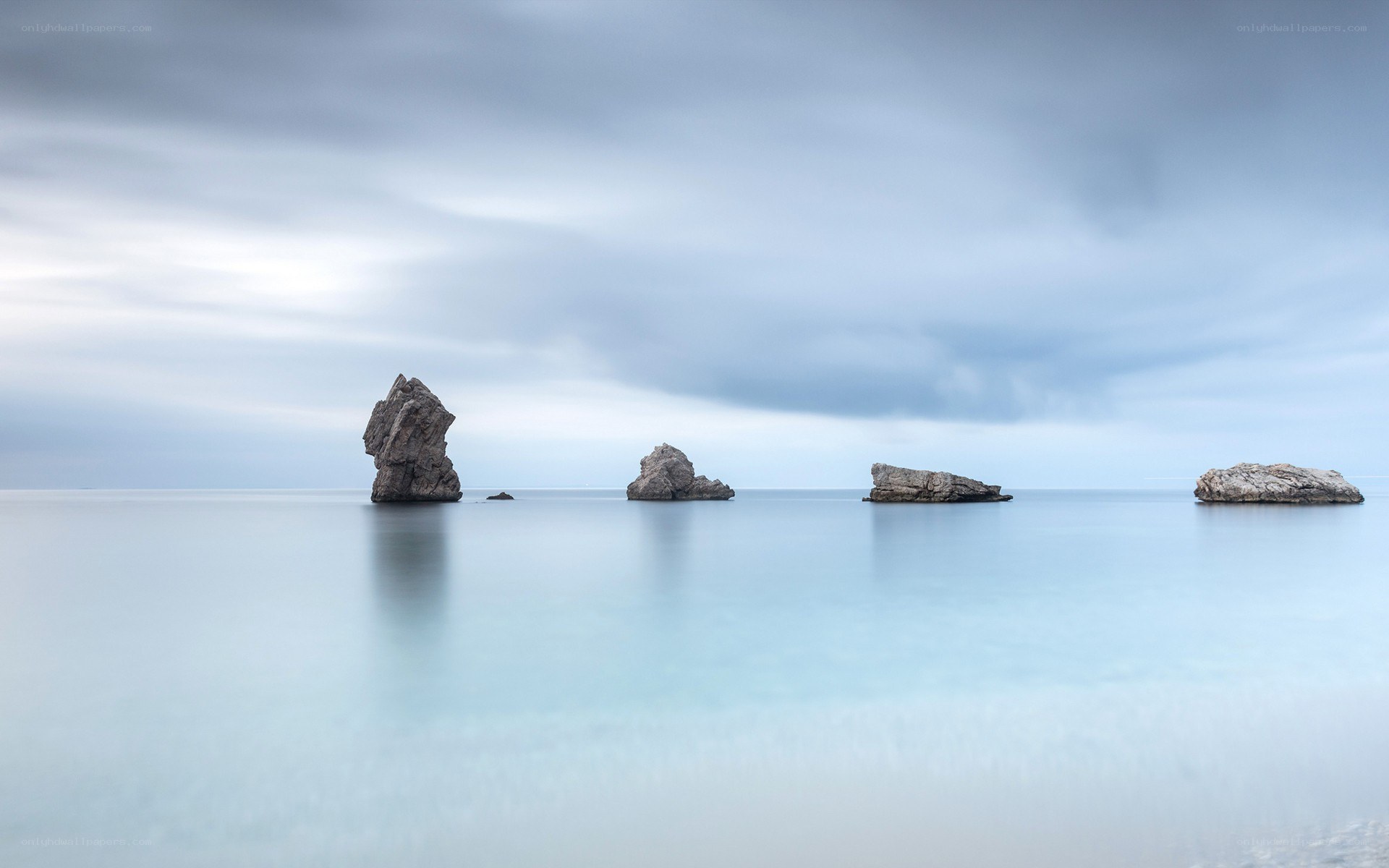 Rock formations in calm sea