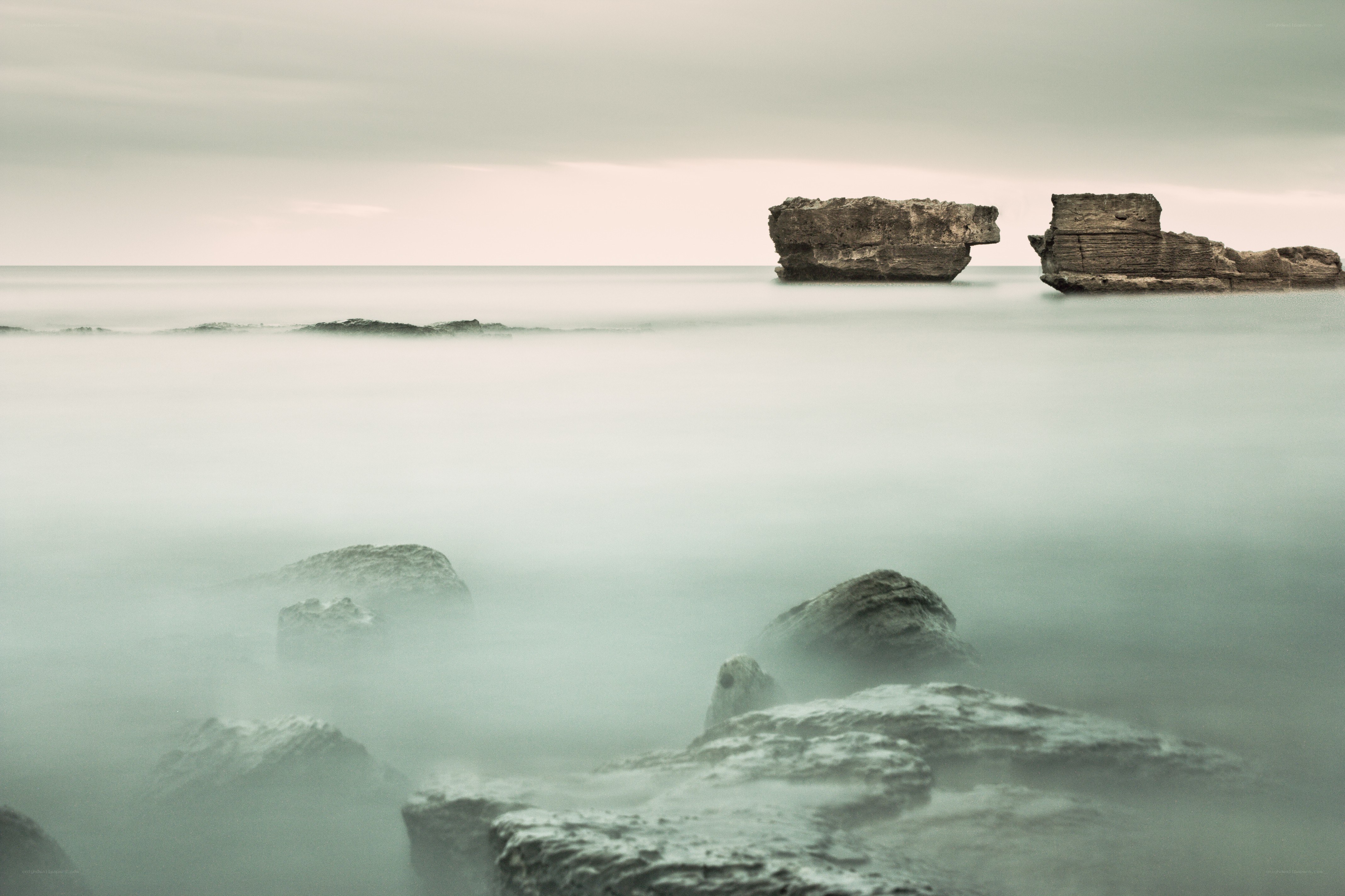 Rock formations in calm sea
