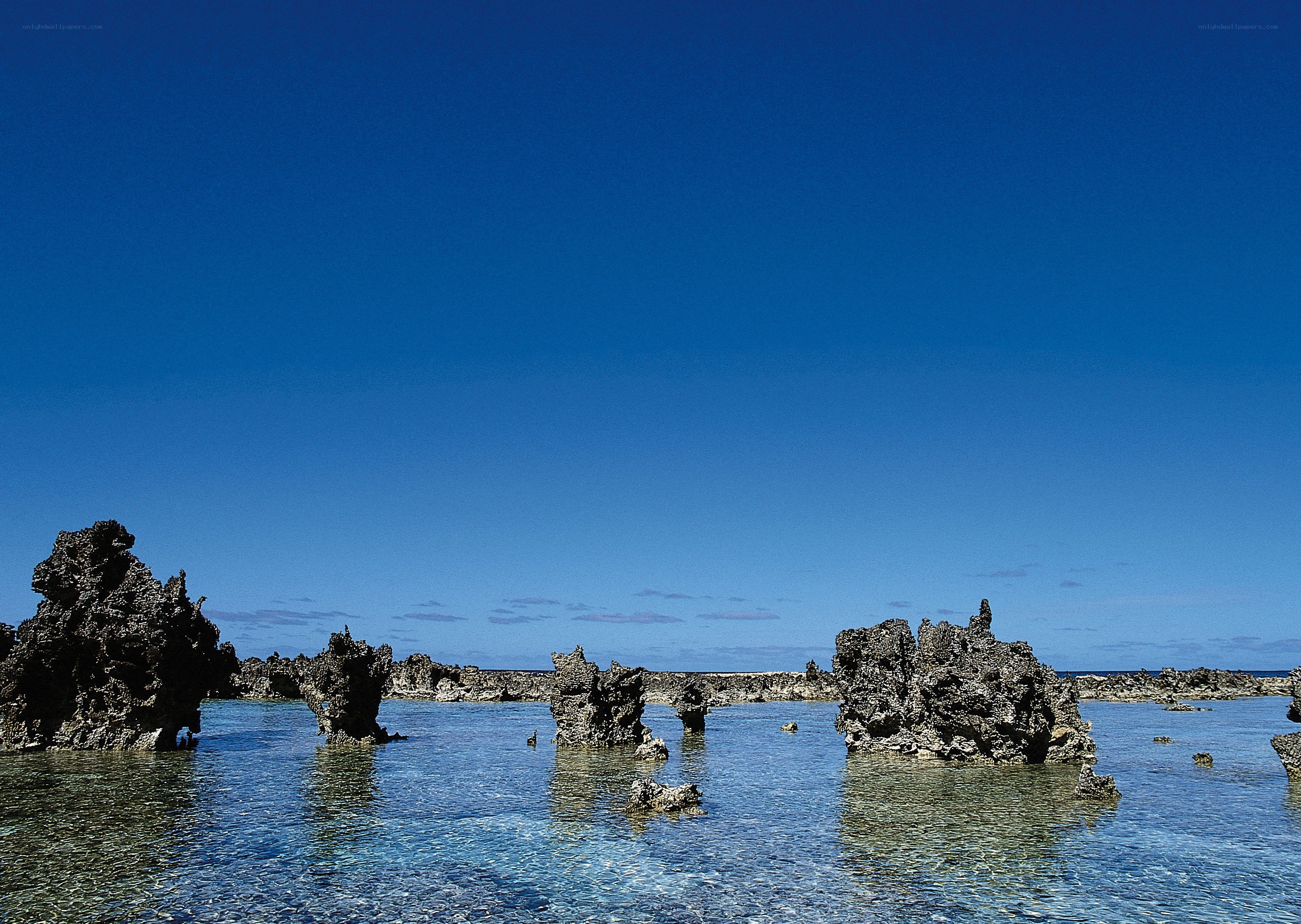 rock formations in clear water