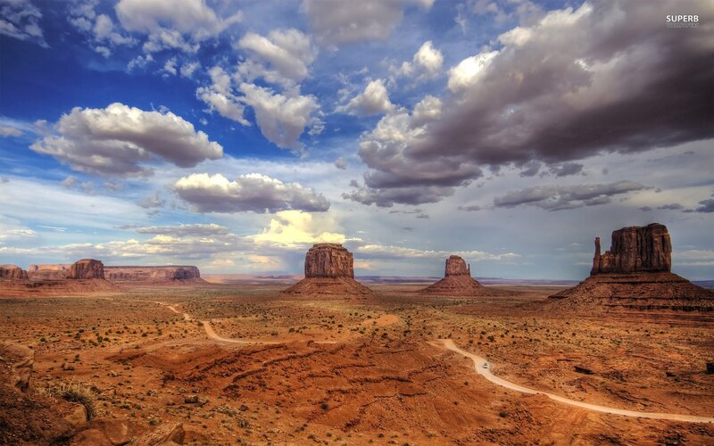 Rock Formations in Desert — Blue, Dramatic, Afternoon, Photograph, Clouds, Dirt Road