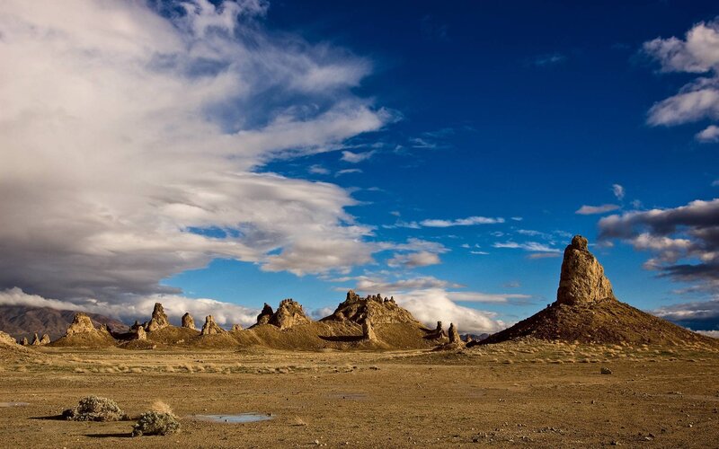 Rock Formations in Desert — Blue, Dramatic, Afternoon, Photograph, Clouds, Mountains