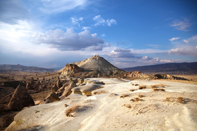 Rock Formations in Desert — Blue, Dramatic, Afternoon, Photograph, Mountain