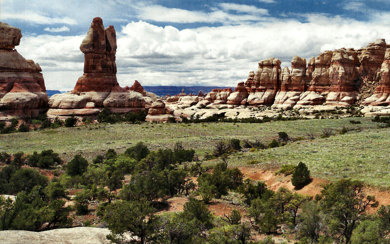 Rock Formations in Desert — Blue, Dramatic, Afternoon, Photograph, Sandstone
