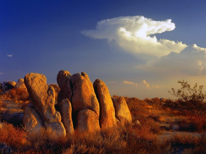 Rock Formations in Desert — Blue, Dramatic, Sunset, Photograph, Clouds, Shrubs