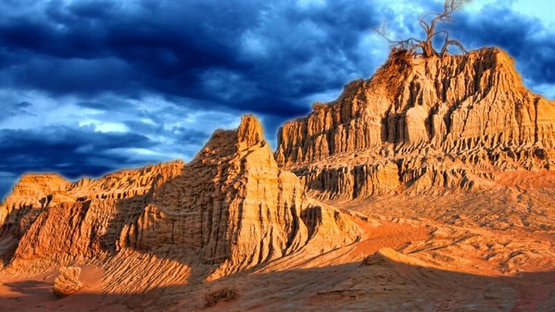 Rock Formations in Desert — Blue, Dramatic, Sunset, Photograph, Clouds