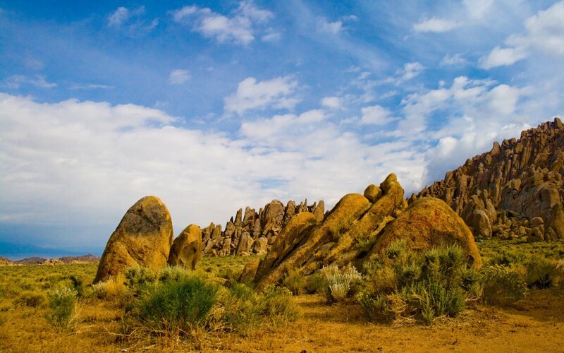Rock Formations in Desert — Blue, Serene, Afternoon, Photograph, Rocks, Sky, Vegetation