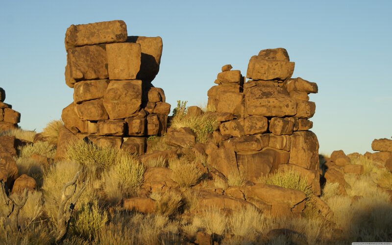Rock Formations in Desert — Brown, Serene, Sunset