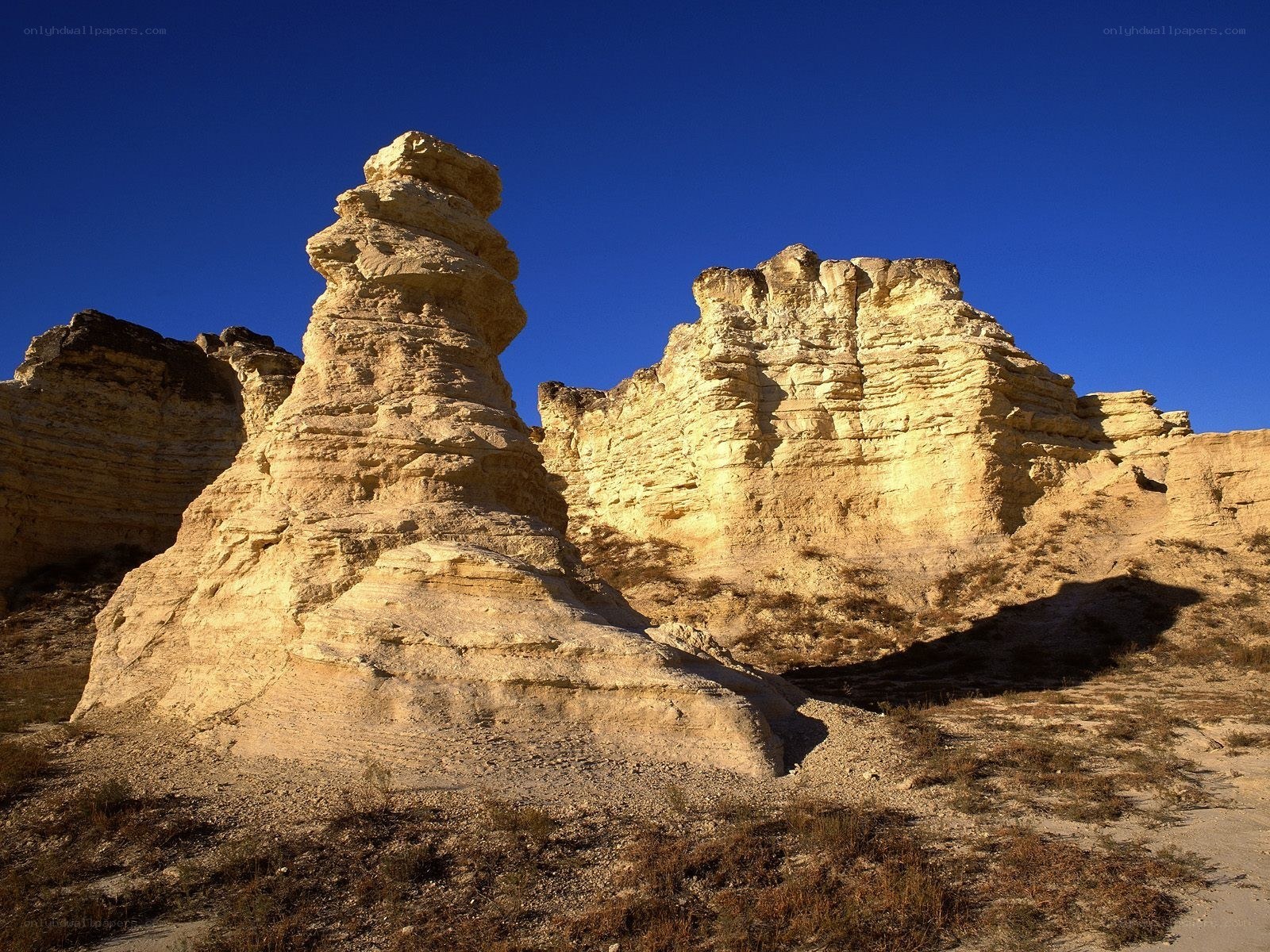 Rock formations in desert landscape