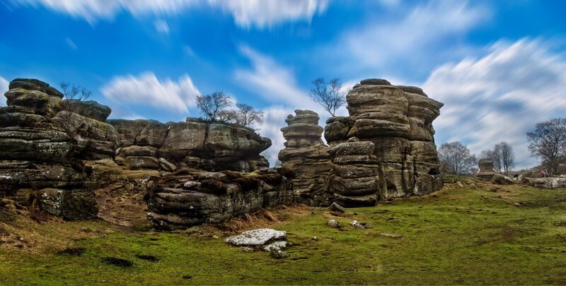 Rock Formations in Field — Blue