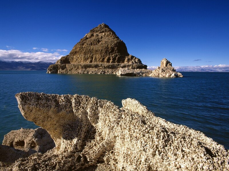 Rock Formations in Lake — Blue, Serene, Afternoon, Photograph, Mountains, Sky, Brown