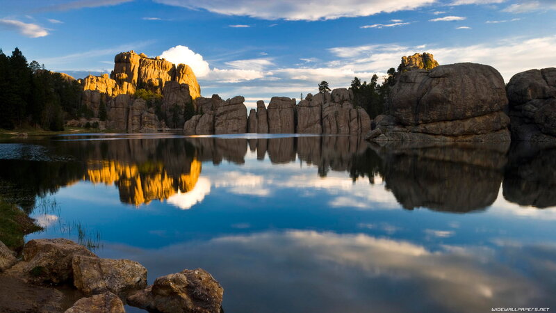 Rock Formations in Lake — Blue, Serene, Sunset