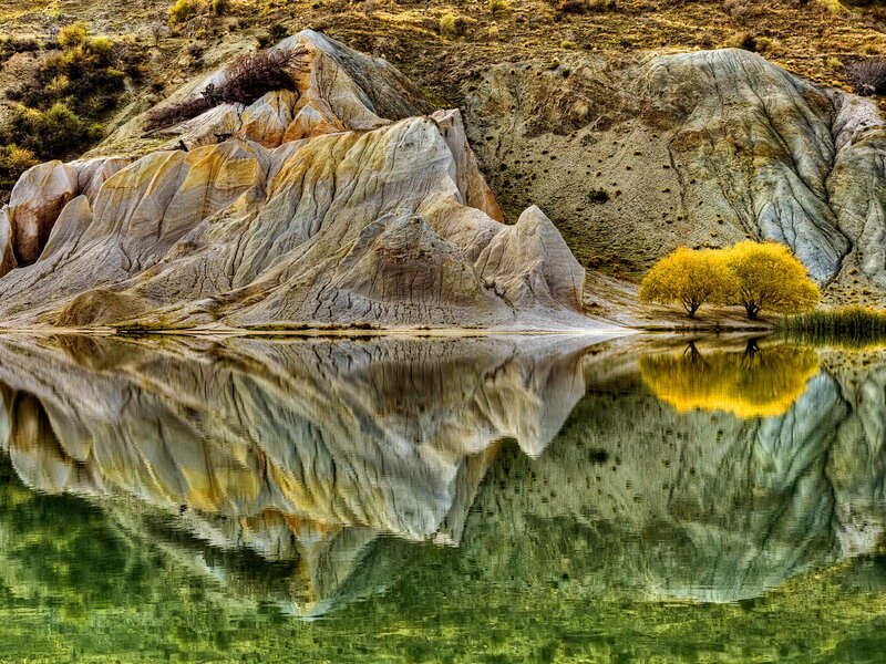 Rock Formations in Lake — Green, Serene, Afternoon