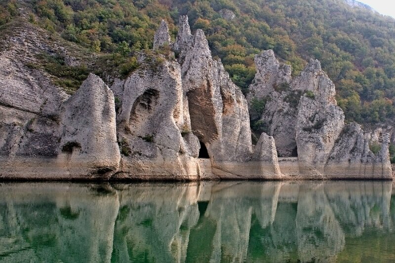 Rock Formations in Lake — Green
