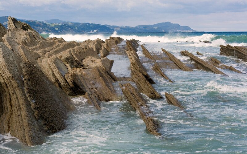 Rock Formations in Ocean — Blue, Dramatic, Afternoon, Photograph, Waves, Mountains