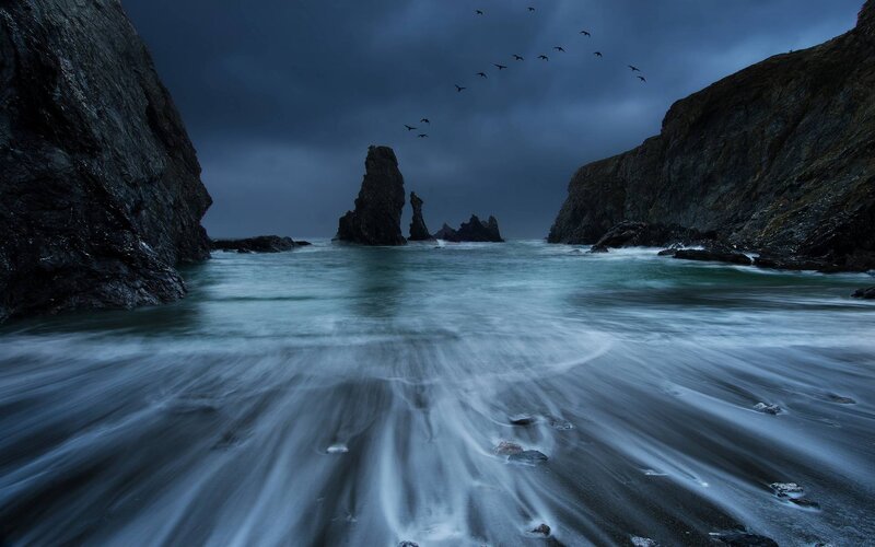 Rock Formations in Ocean — Blue, Dramatic, Night, Photograph