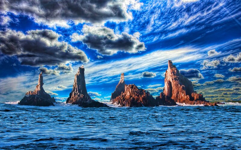 Rock Formations in Ocean — Blue, Dramatic, Photograph, Clouds