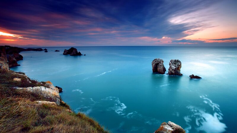 Rock Formations in Ocean — Blue, Dramatic, Sunset, Photograph, Sky, Cliff