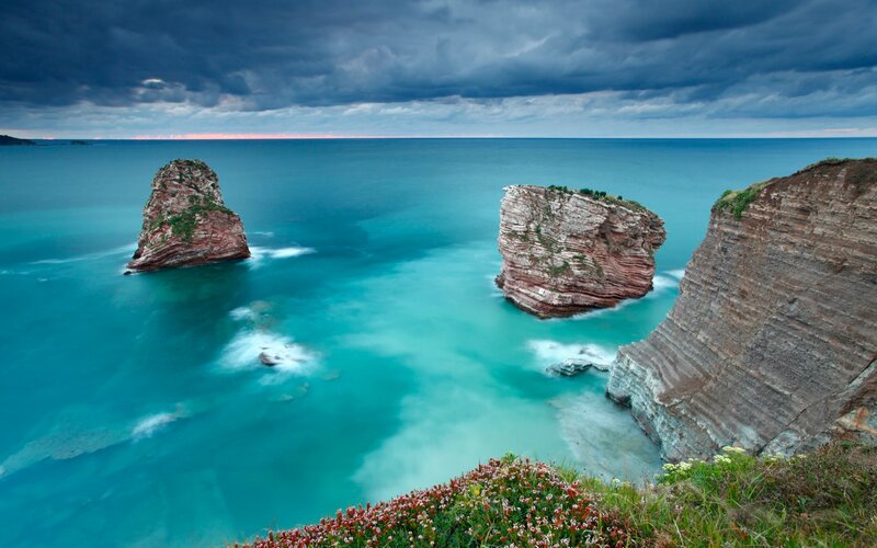 Rock Formations in Ocean — Blue, Dramatic, Sunset