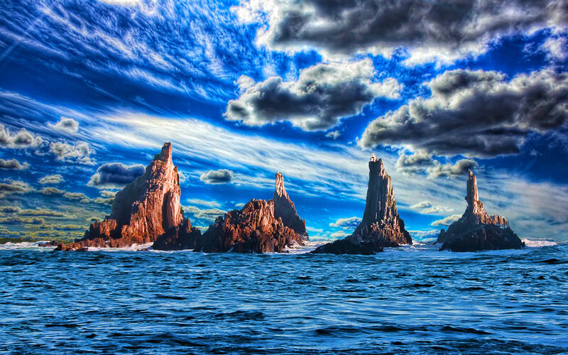 Rock Formations in Ocean — Blue, Dramatic