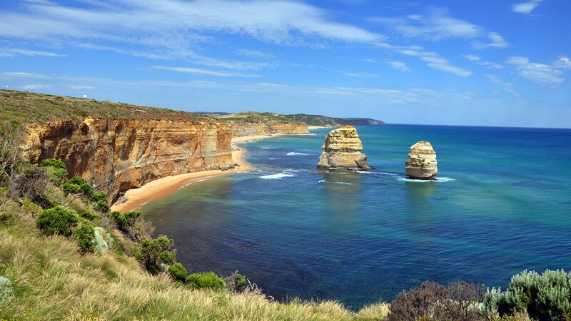Rock Formations in Ocean — Blue, Serene, Afternoon, Photograph, Cliffs, Beach, Green, Brown