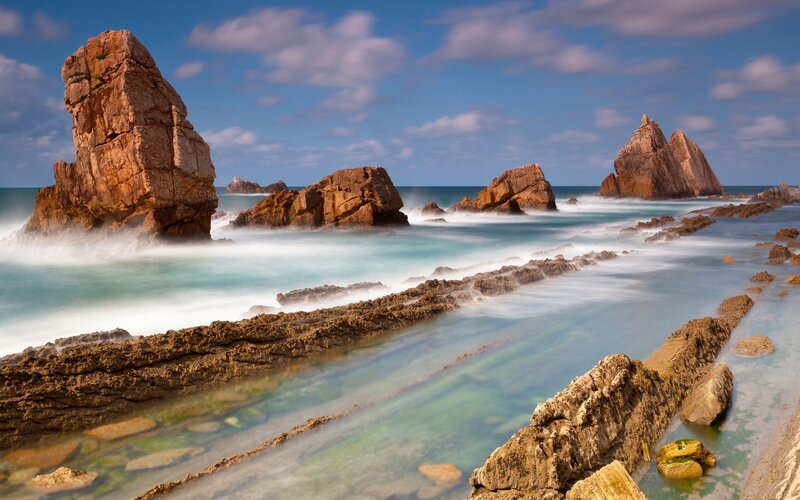 Rock Formations in Ocean — Blue, Serene, Afternoon, Photograph, Rocks, Sky, Waves