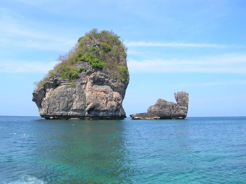 Rock Formations in Ocean — Blue, Serene, Afternoon, Photograph, Sky, Trees