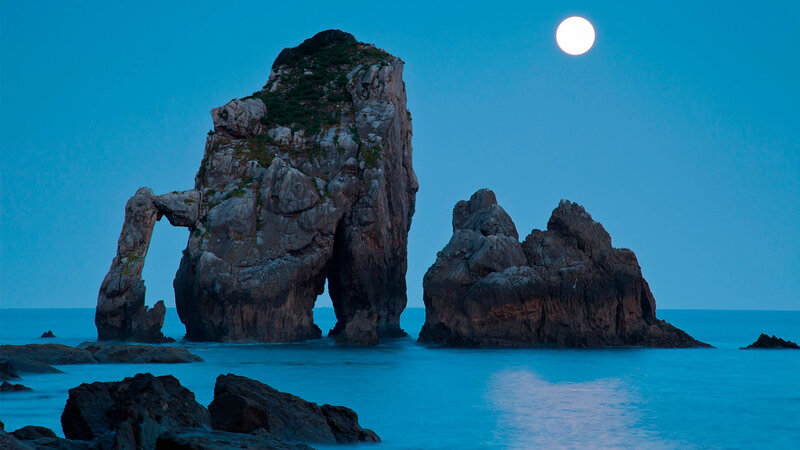 Rock Formations in Ocean — Blue, Serene, Night, Photograph, Moon, Sea