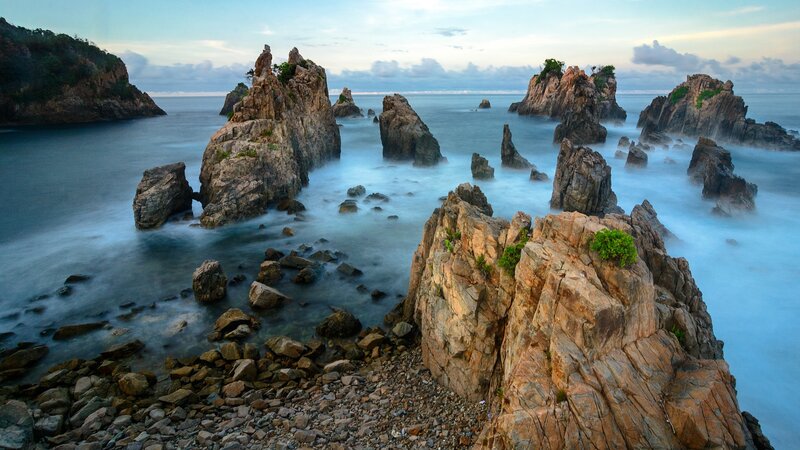 Rock Formations in Ocean — Blue, Serene, Sunset, Photograph, Sky, Rocks, Plants