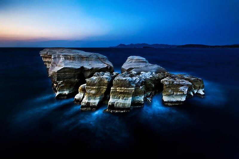 Rock Formations in Ocean — Blue, Serene, Sunset, Photograph, Sky