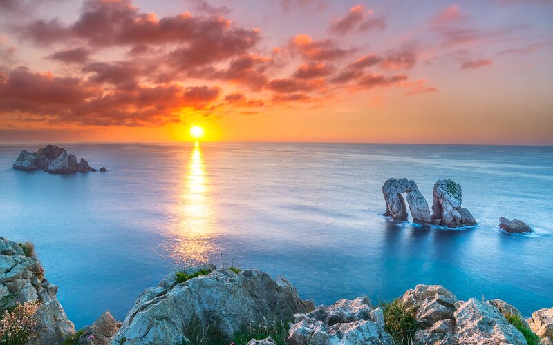 Rock Formations in Ocean — Blue, Serene, Sunset, Photograph, Sun